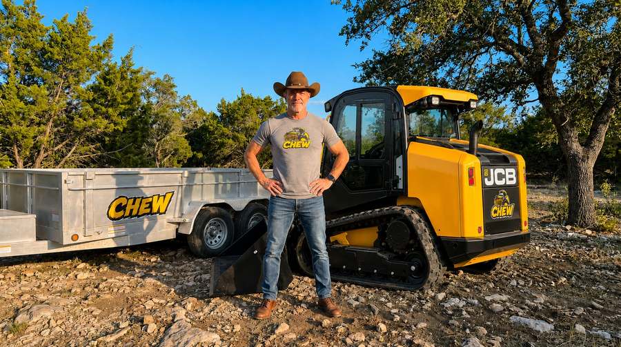 CHEW owner with JCB track loader and branded trailer